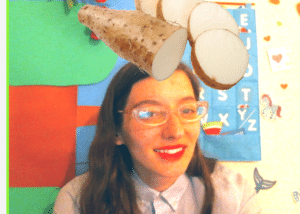 me using Manycam with a "YAM" on my head while I am teaching CVC words