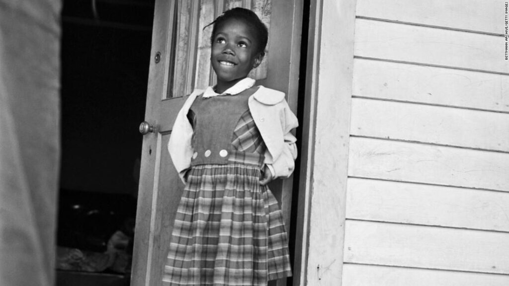 Black and white photo of Ruby Bridges at six years old