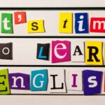 a photo of the words 'it's time to learn English' in letters of different sizes, fonts and colors