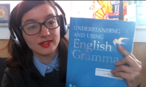 me holding the blue betty azar english grammar book