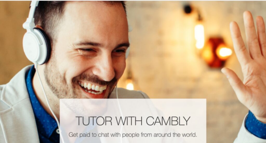 A man with a headset teaching on Cambly 